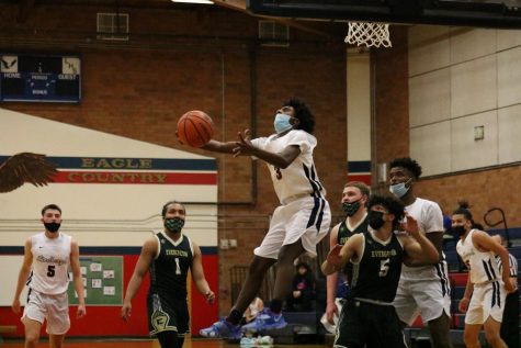 Nathaniel Kassa scored 16 points against Foster, Tuesday night. (Photo from the Evergreen game)