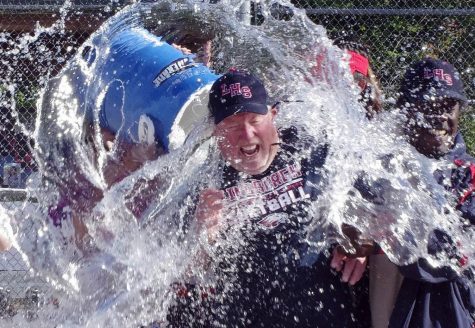 The outgoing seniors surprised head coach Larry Laliberte with a small bath of cold water during their senior night events. Coach Laliberte is retiring after 16 years at the helm.