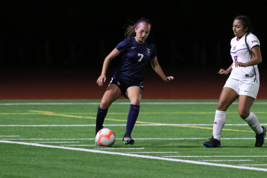 Rachel Ralston drives up the field during their game against Highline. Last night the Eagles beat Sammamish 5-2.