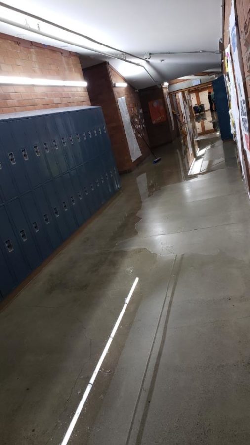 Custodians respond to flooding hallways
