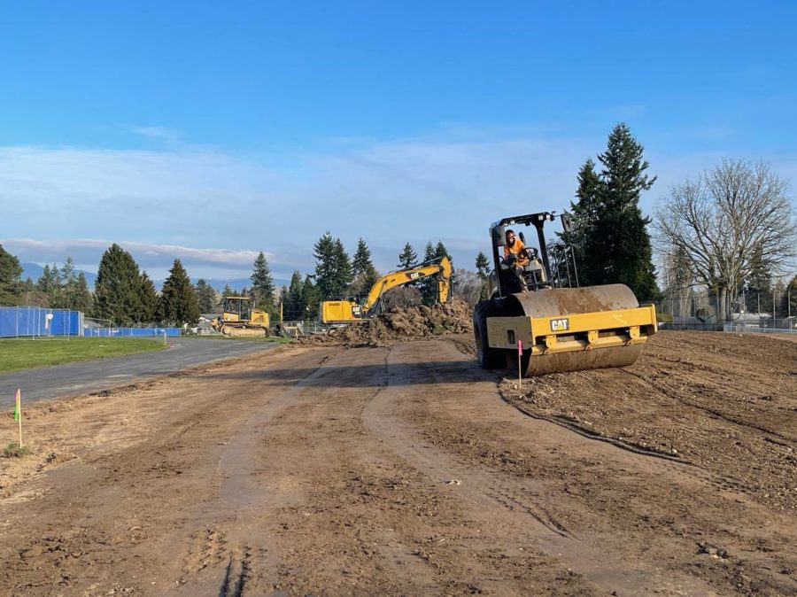 Construction crews begin to prepare the Family First Community Center site next to Cascade Elementary School for building.