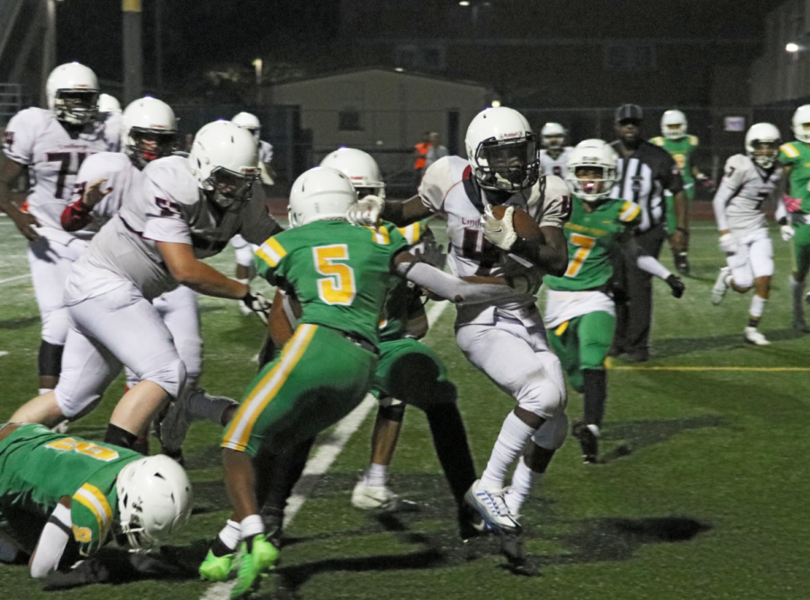 Malik Gilbert runs into the end zone for the game winning score against Clover Park, Sept 21. Gilbert is just one of several players who can contribute to footballs success this season.