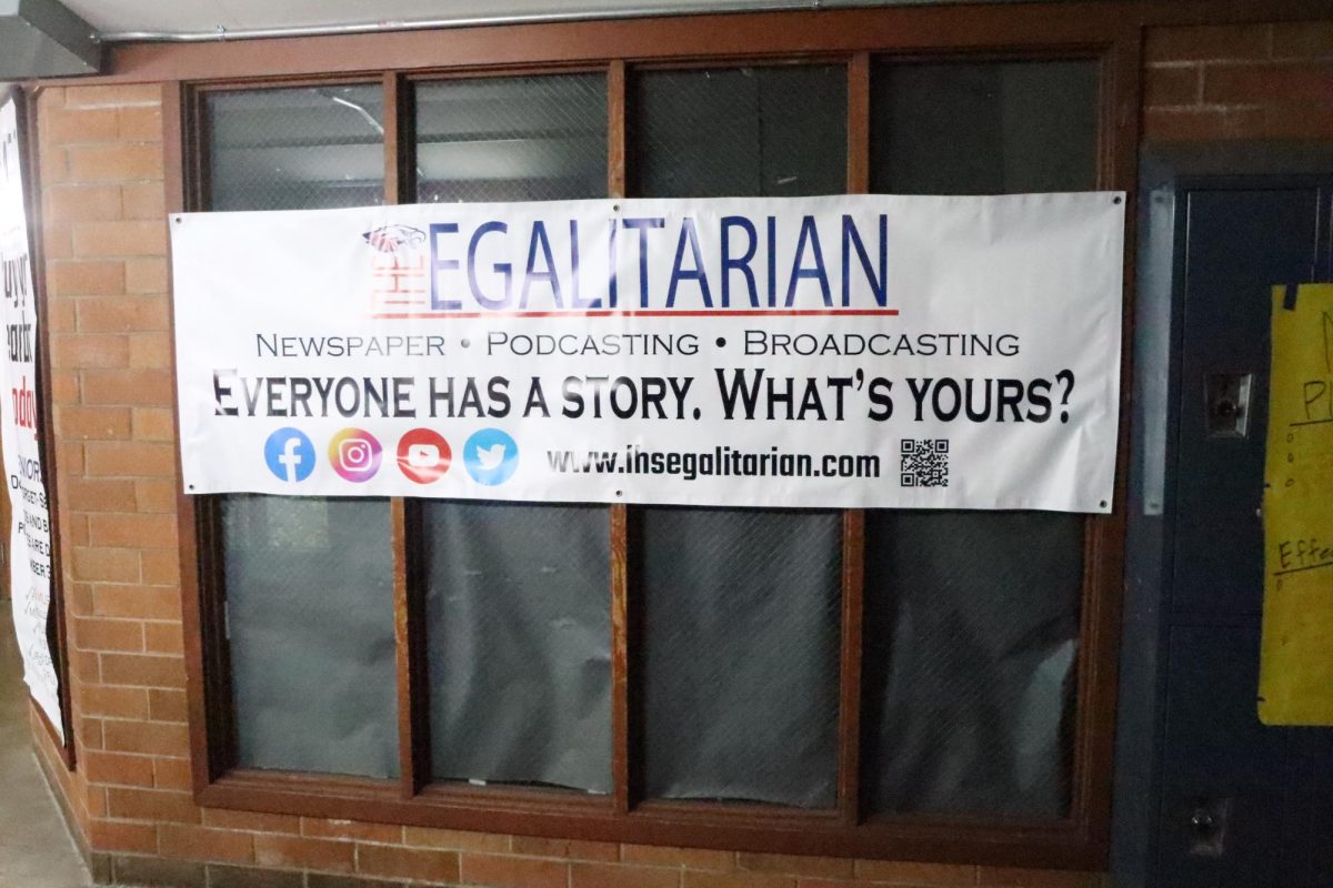 Journalism Banner, located next to Room 215