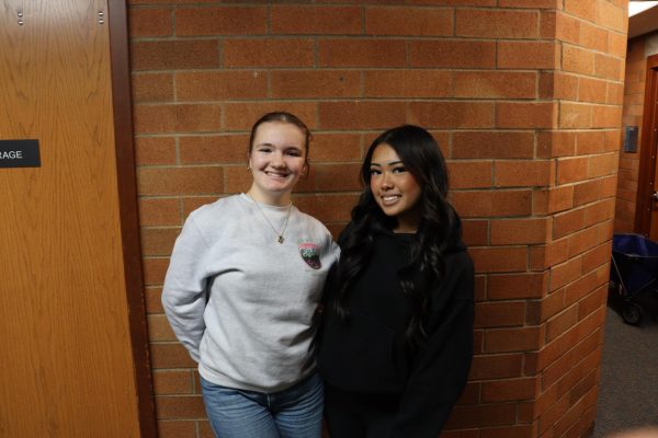 (left to right) Scarlet Van Houten and Rylee Castillo take picture together